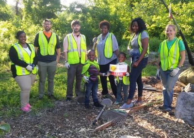 Volunteers help the Sherman tree planting during NeighborWorks Week